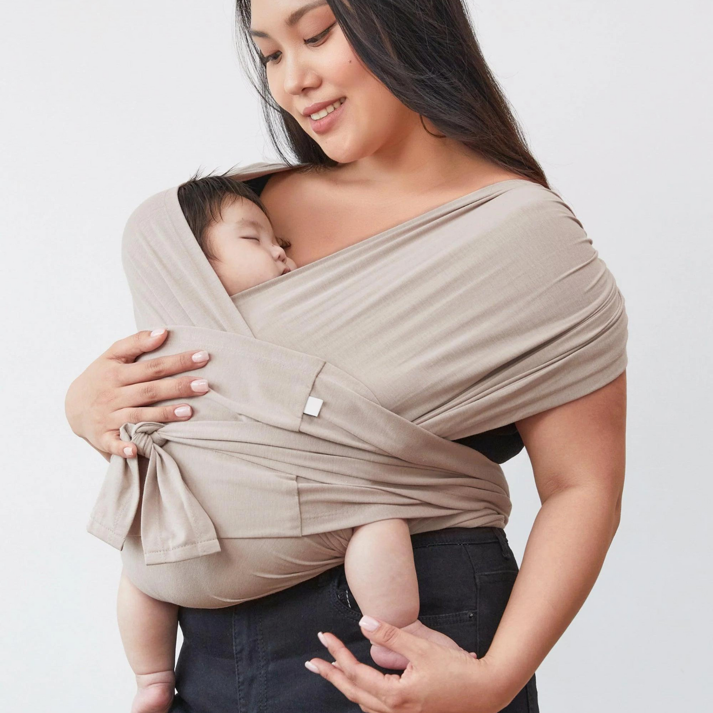 Ergonomic baby carrier wrap for newborns, grey, promoting hip healthy positioning, hands-free parenting