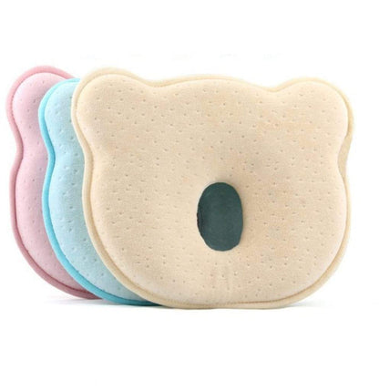 Baby head shaping pillow, white with gentle contour, for flat head prevention and infant support