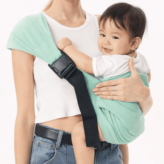 Ergonomic baby hip carrier with wide shoulder strap, gray, parent and baby comfort