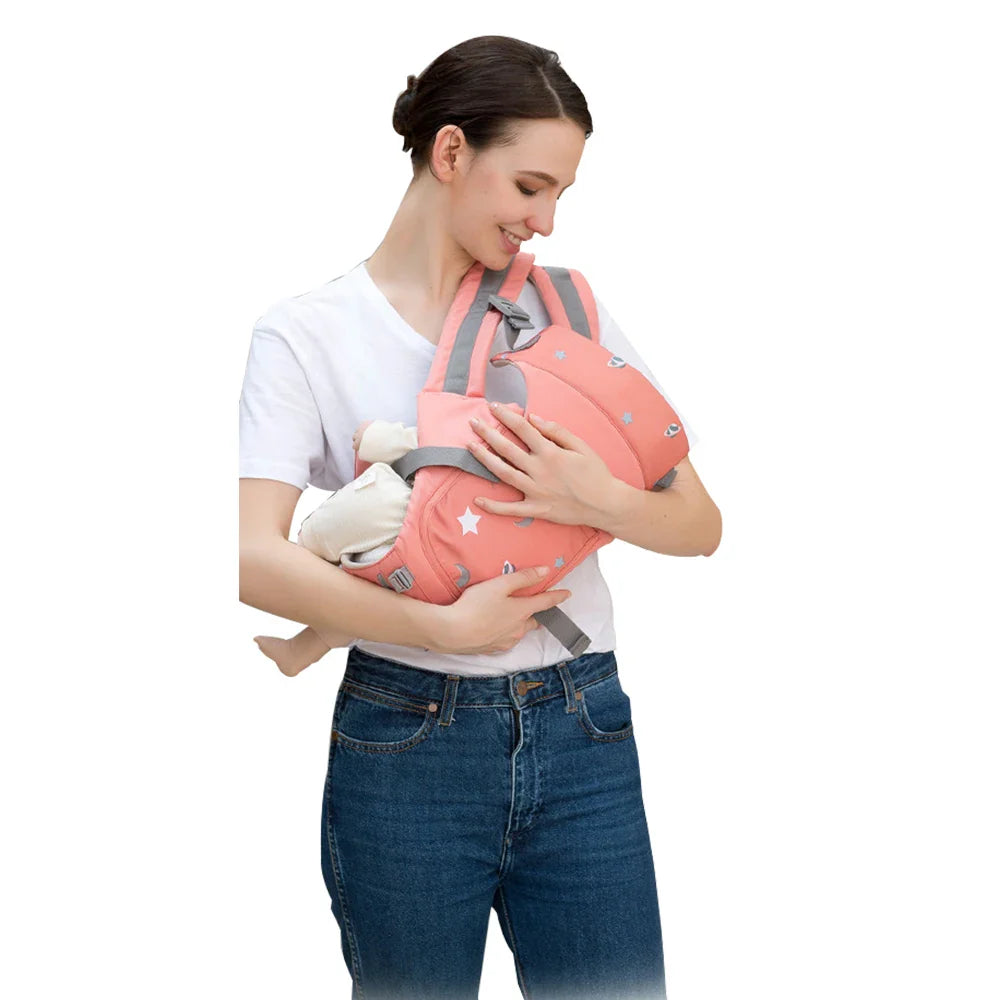 Dad carrying baby front-facing in ergonomic hipseat carrier, breathable for outdoor use.