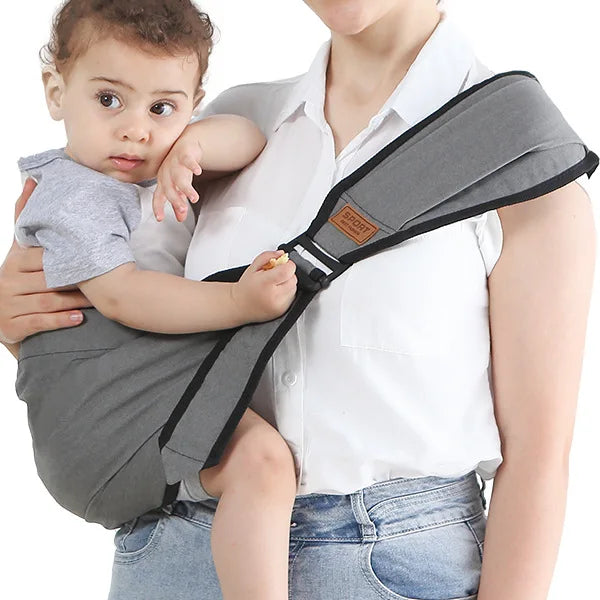 Adjustable pink infant carrier with padded waist stool, ergonomic and comfortable for baby