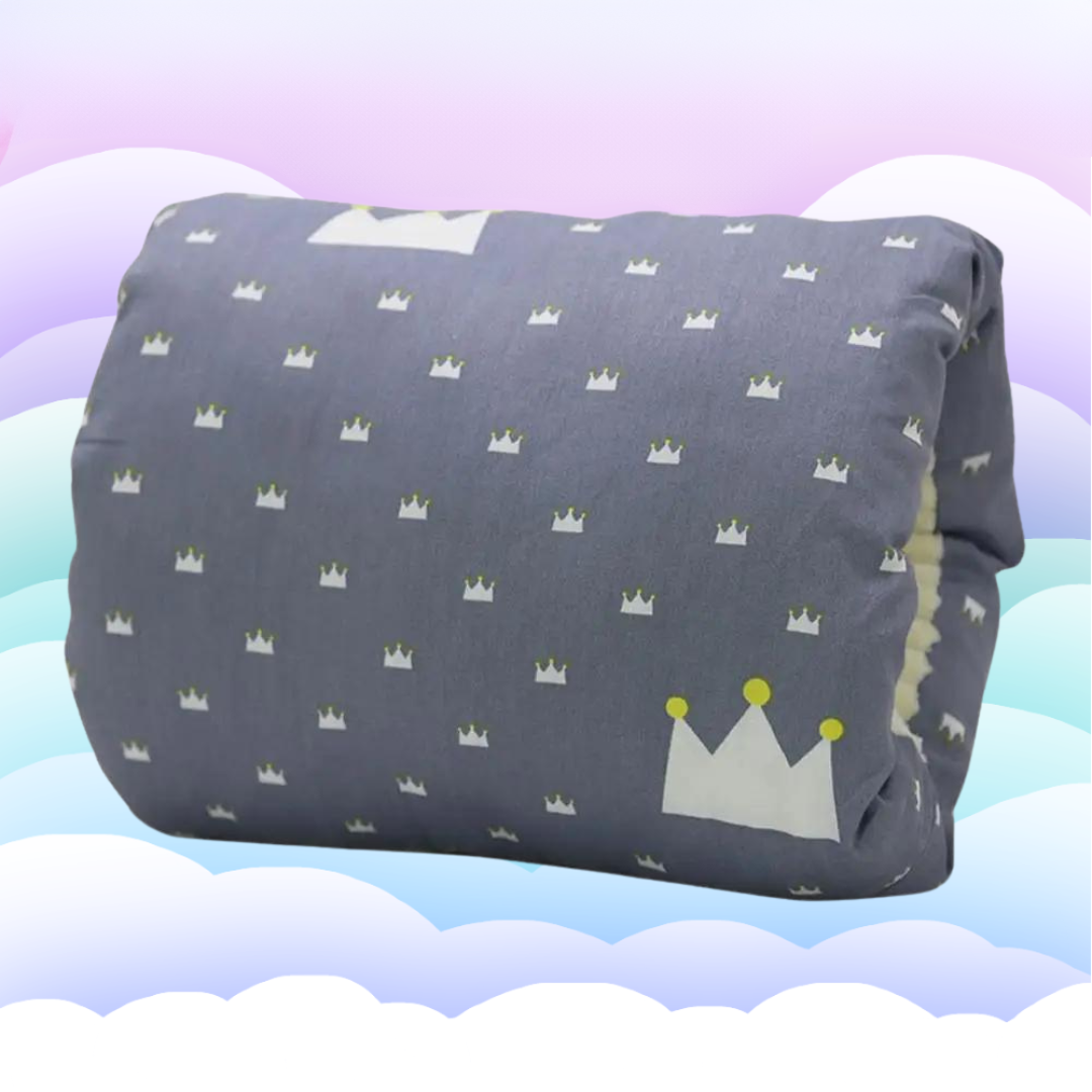 Ergonomic feeding cushion with a contoured shape, perfect for comfortable newborn feeding