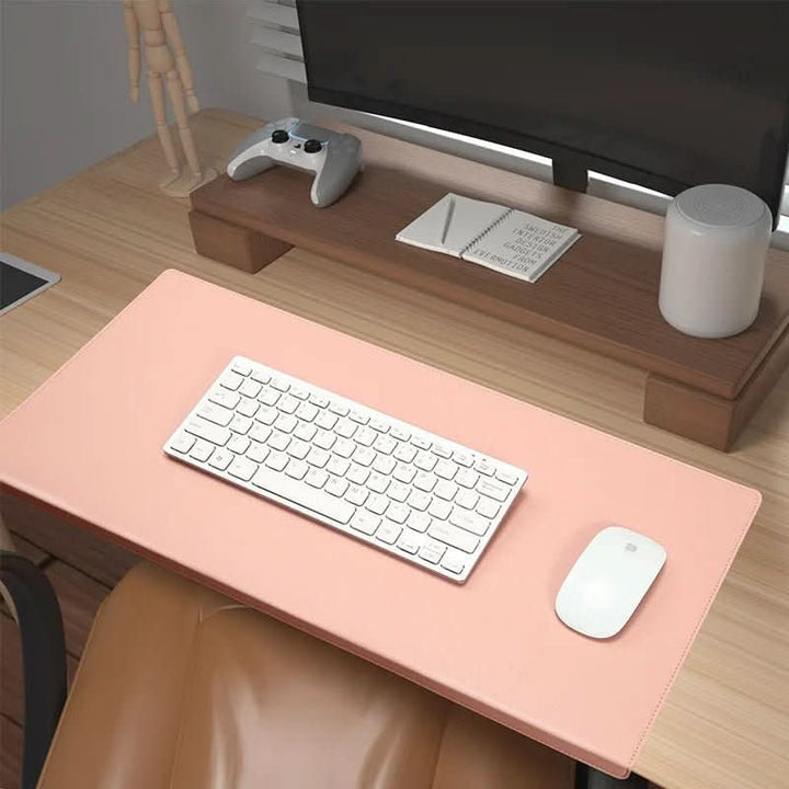 Ergonomic PU leather desk mat with integrated wrist rest for enhanced comfort & productivity in office.