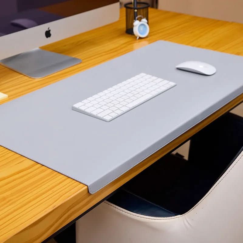 Ergonomic PU leather desk mat accessory featuring a comfortable wrist rest, improving office comfort.