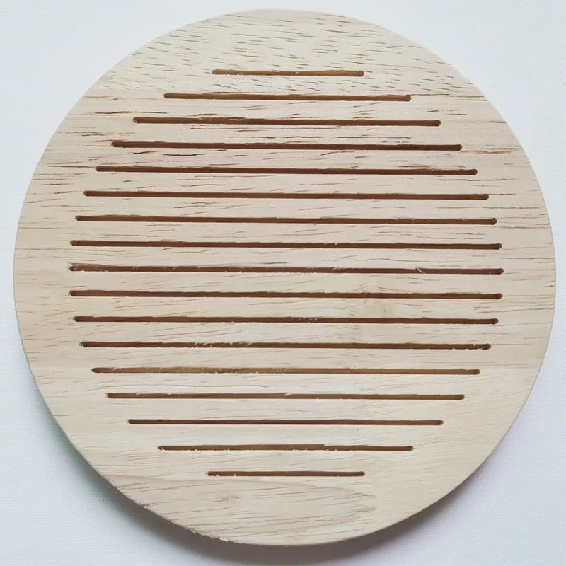 Set of oak baby milestone discs and board, essential baby photography props for monthly milestones.