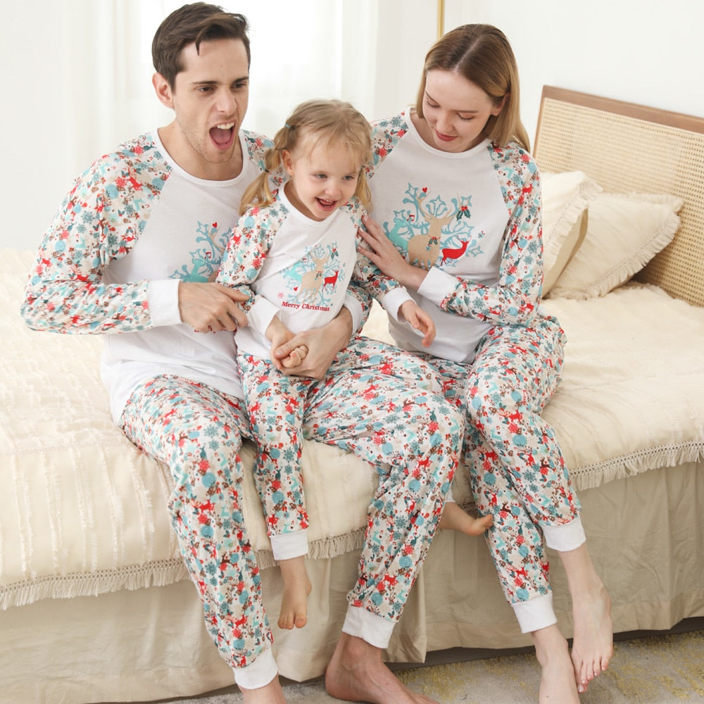 Full range of family Christmas long sleeve pajamas displayed, various sizes for adults, kids, and toddlers