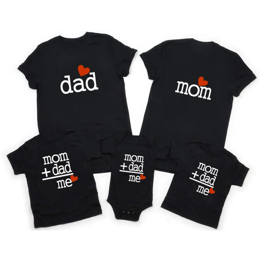 Family in matching cotton t-shirts and baby romper, perfect for family photos