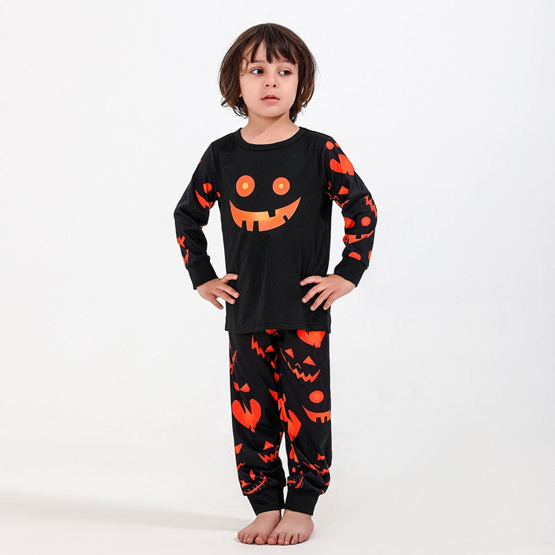 Comfortable stretch Halloween skeleton print pajama set, ideal for family matching outfits and cozy wear.