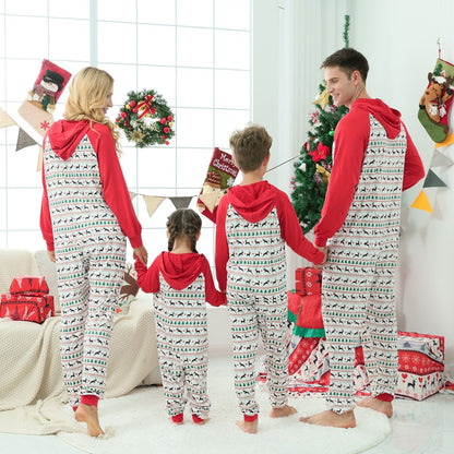 Full shot of family of four in matching festive red Christmas tree one-piece pajamas, front view.