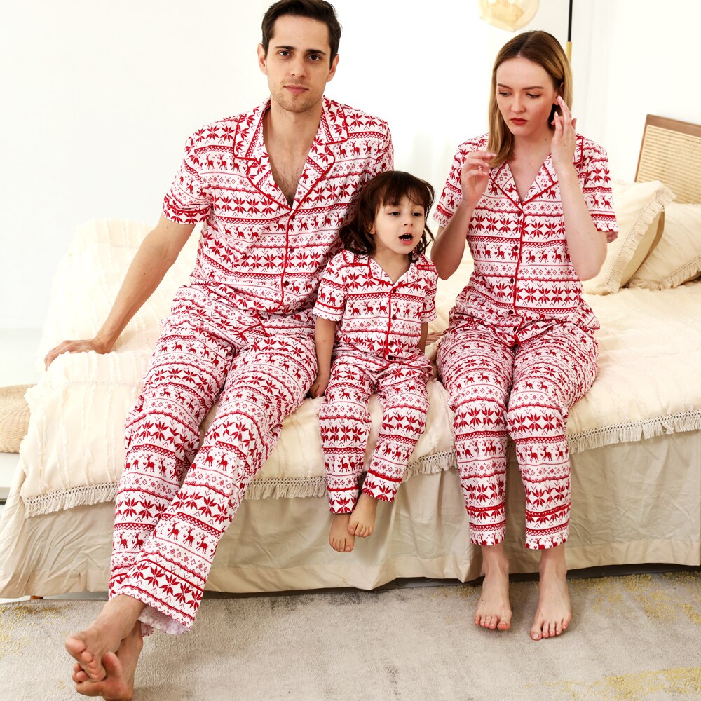Unisex red short-sleeve pajama top with holiday print, perfect for family loungewear
