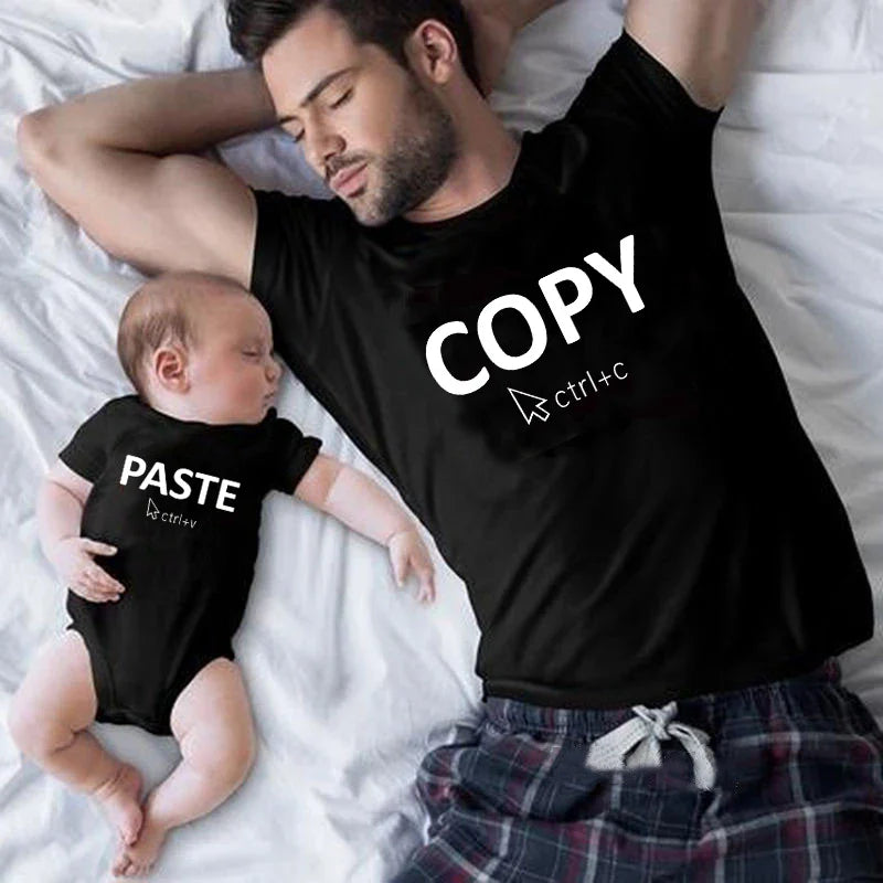 Family in matching white copy paste t-shirts & baby romper, 100% cotton blend casual wear
