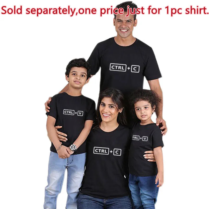 Family of three in matching black copy paste shirts, perfect short sleeve cotton blend casual wear