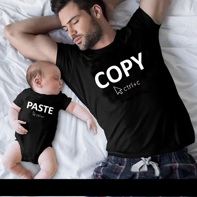 Casual family outfit: parents in 'copy'/'paste' shirts, baby in 'paste' romper, short sleeve set