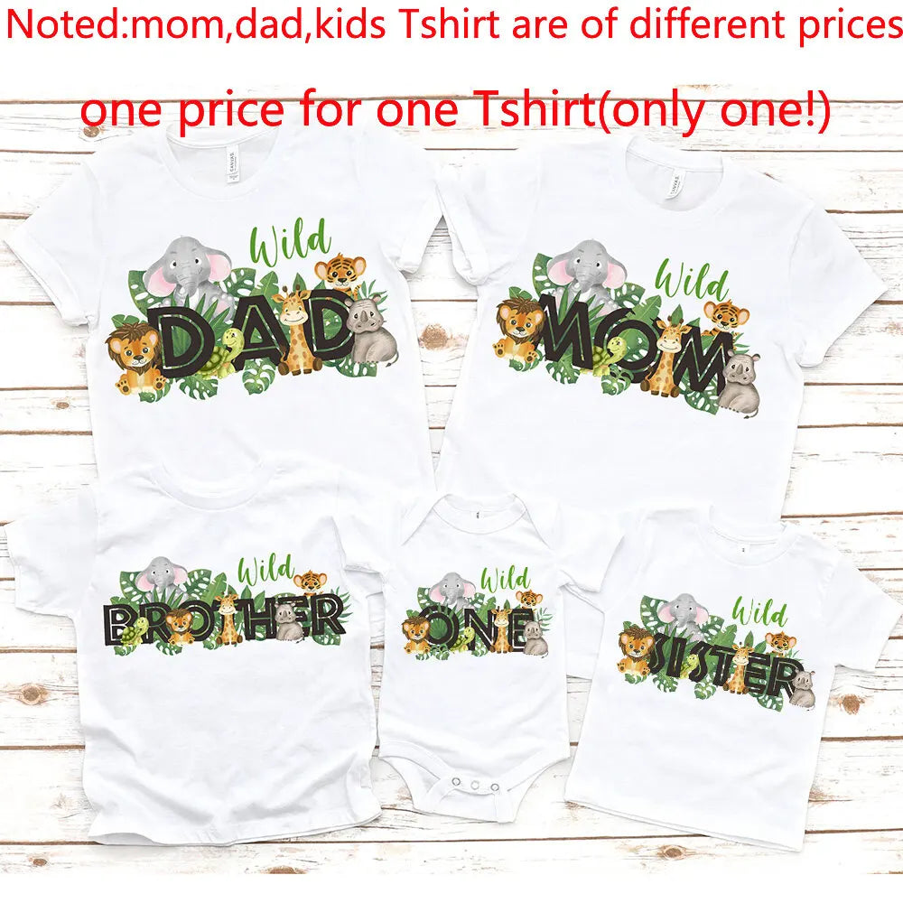 Happy family of three wearing wild print t-shirts and romper, perfect for summer casual wear.
