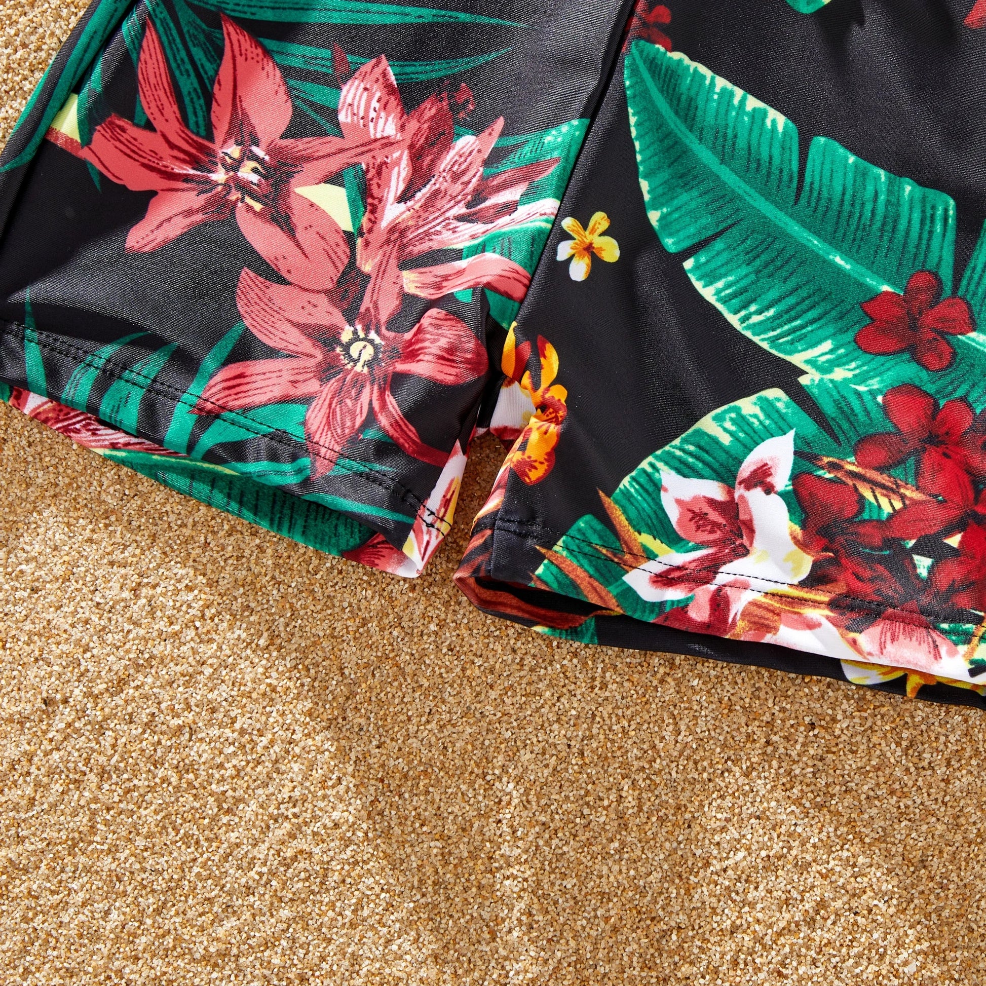 Colorful tropical print halter swimsuit for women, ideal for summer fashion.