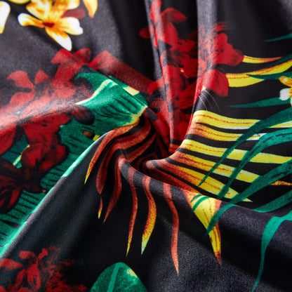Men's floral quick-dry drawstring swim trunks, matching family's tropical beachwear.