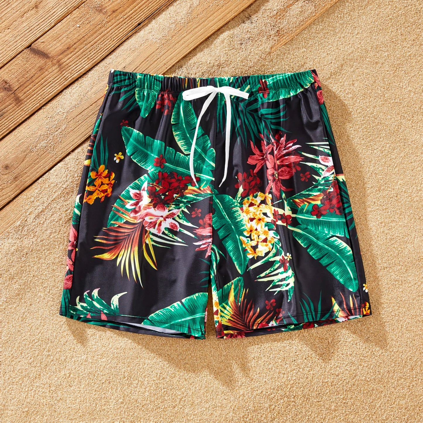 Family matching tropical print swimwear for a fun summer vacation outfit.