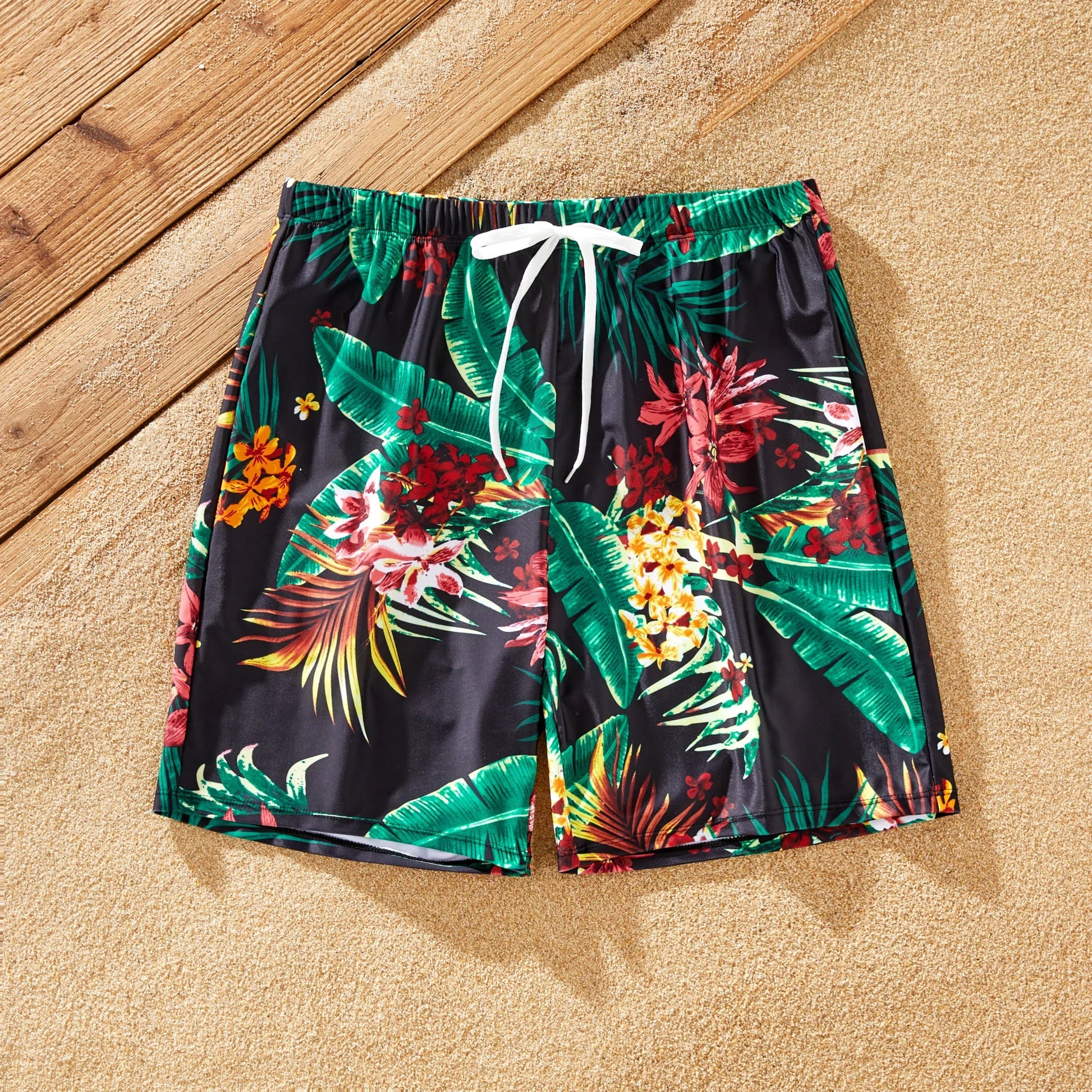 Family matching tropical print swimwear for a fun summer vacation outfit.