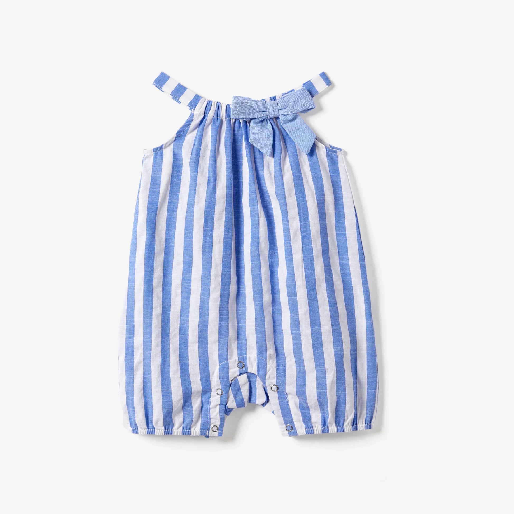 Family matching blue and white stripe dresses and shirts with tassel trim for summer vacation.