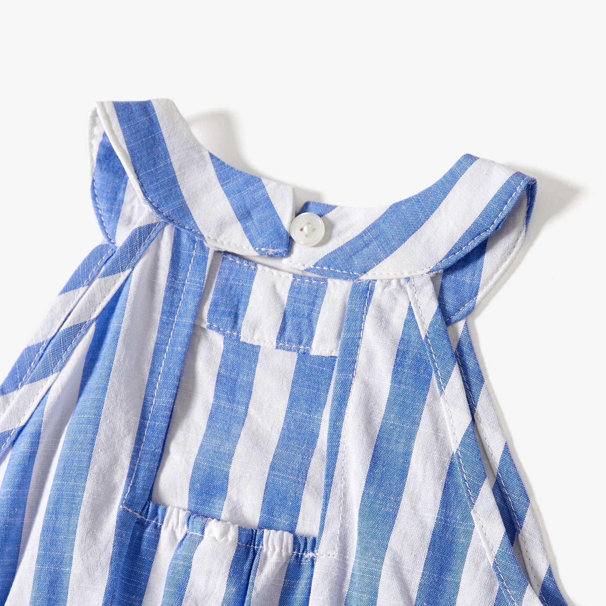 Set of four family matching stripe outfits with tassels, ideal for a beach holiday or picnic.