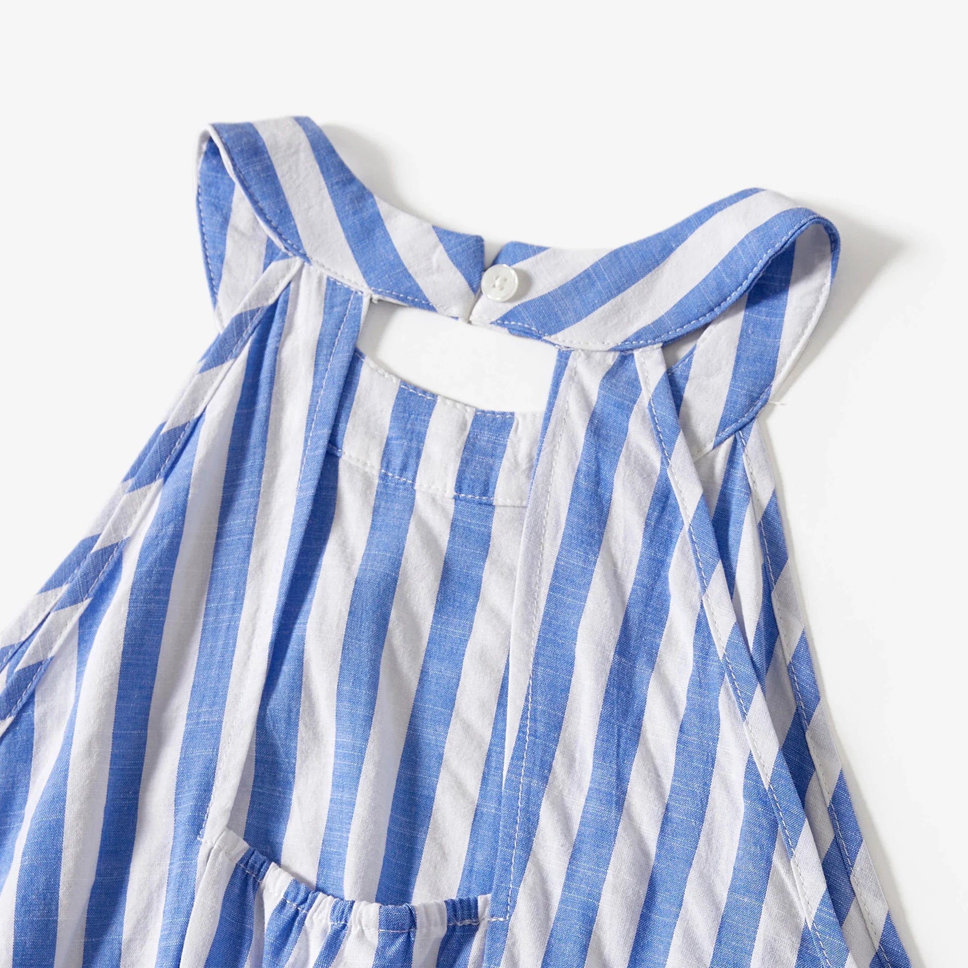 Kid's blue and white stripe shirt with tassel details, part of a family matching ensemble.