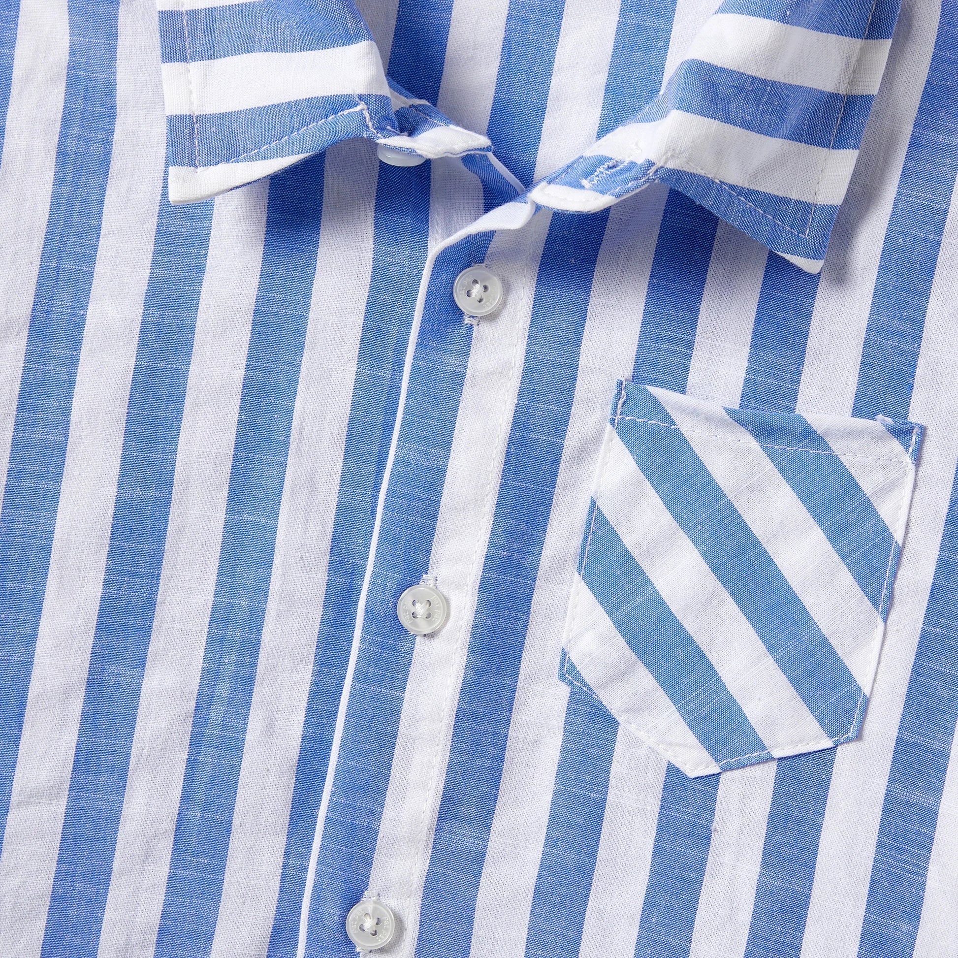 Display of the entire family matching stripe outfit collection, including dresses and shirts with tassels.