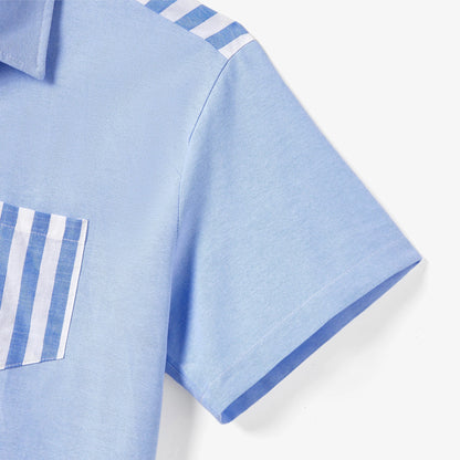 Family matching casual wear: blue and white stripe dresses and shirts, all featuring chic tassel trim.