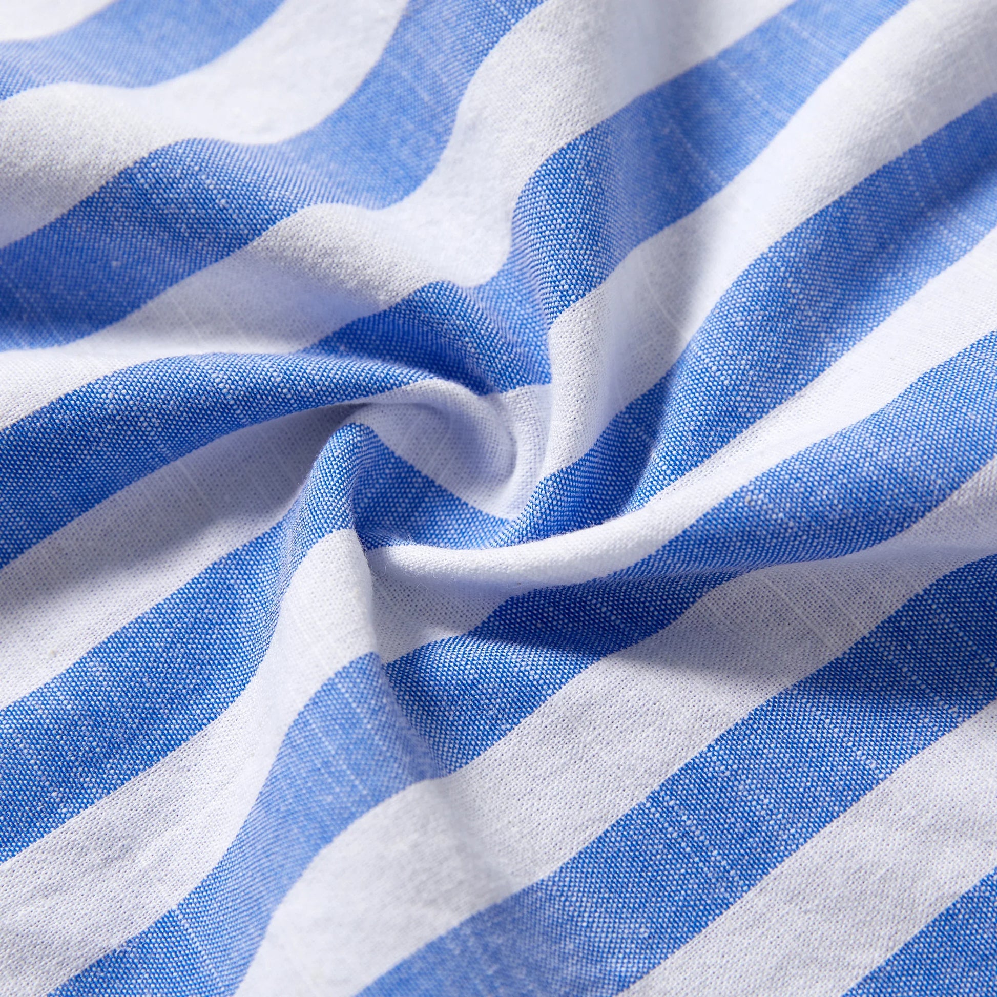 Summer family matching apparel: stripe dresses with tassel trim for women/girls, stripe shirts for men/boys.