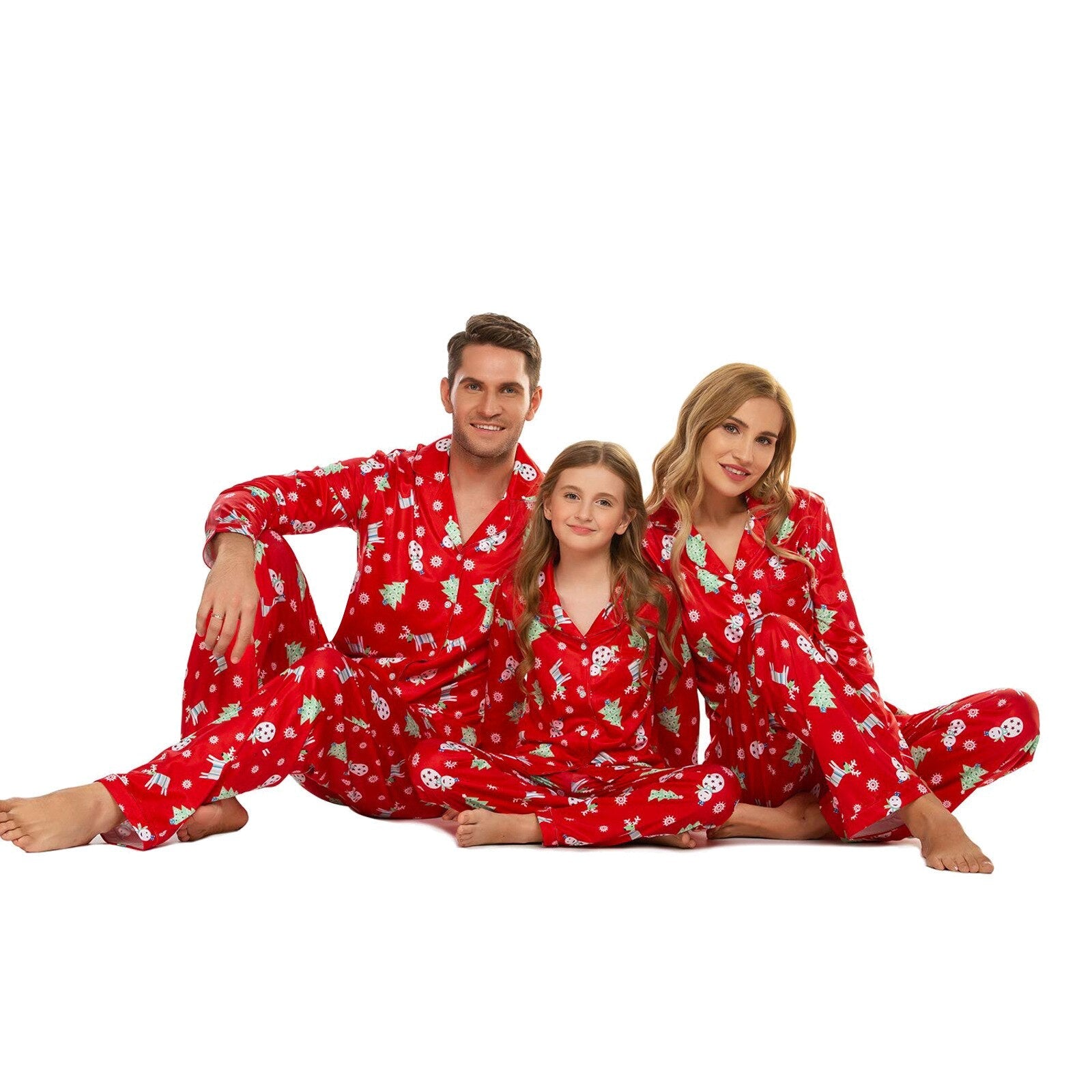 Full shot of a family showcasing their matching Christmas pajamas, ideal for holiday photos