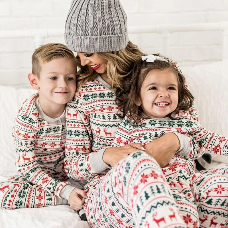 Family in cozy cotton blend Christmas pajamas, festive holiday apparel for matching sets