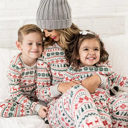 Family in cozy cotton blend Christmas pajamas, festive holiday apparel for matching sets