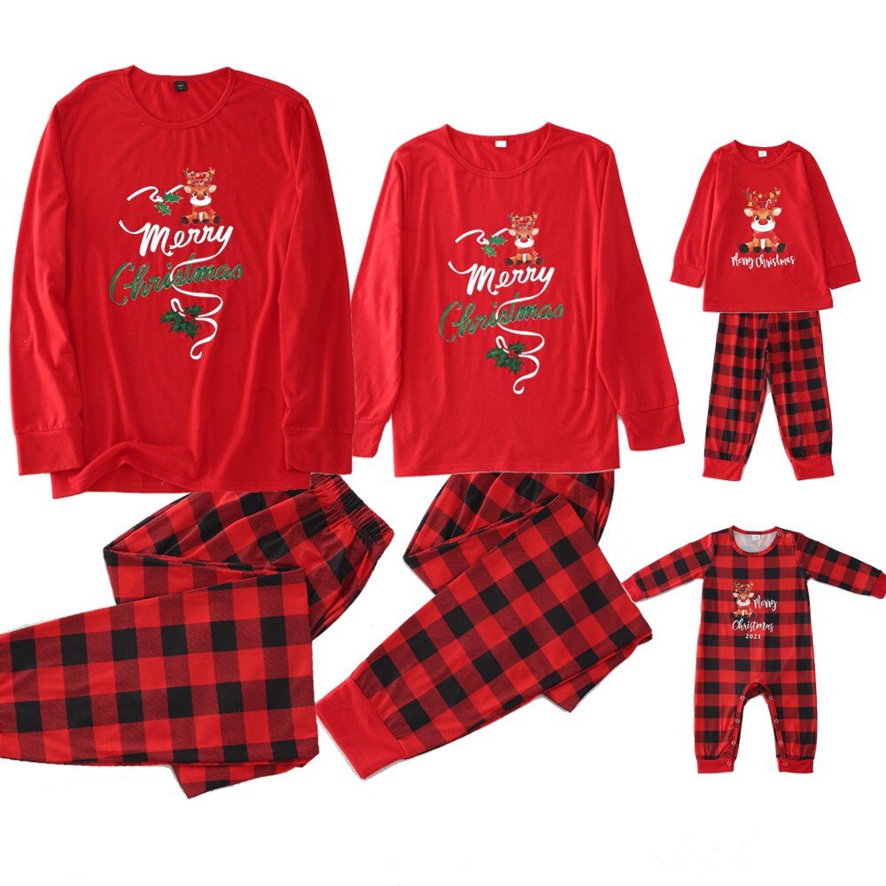Close-up of a baby wearing red and white striped family Christmas pajamas, perfect for holidays