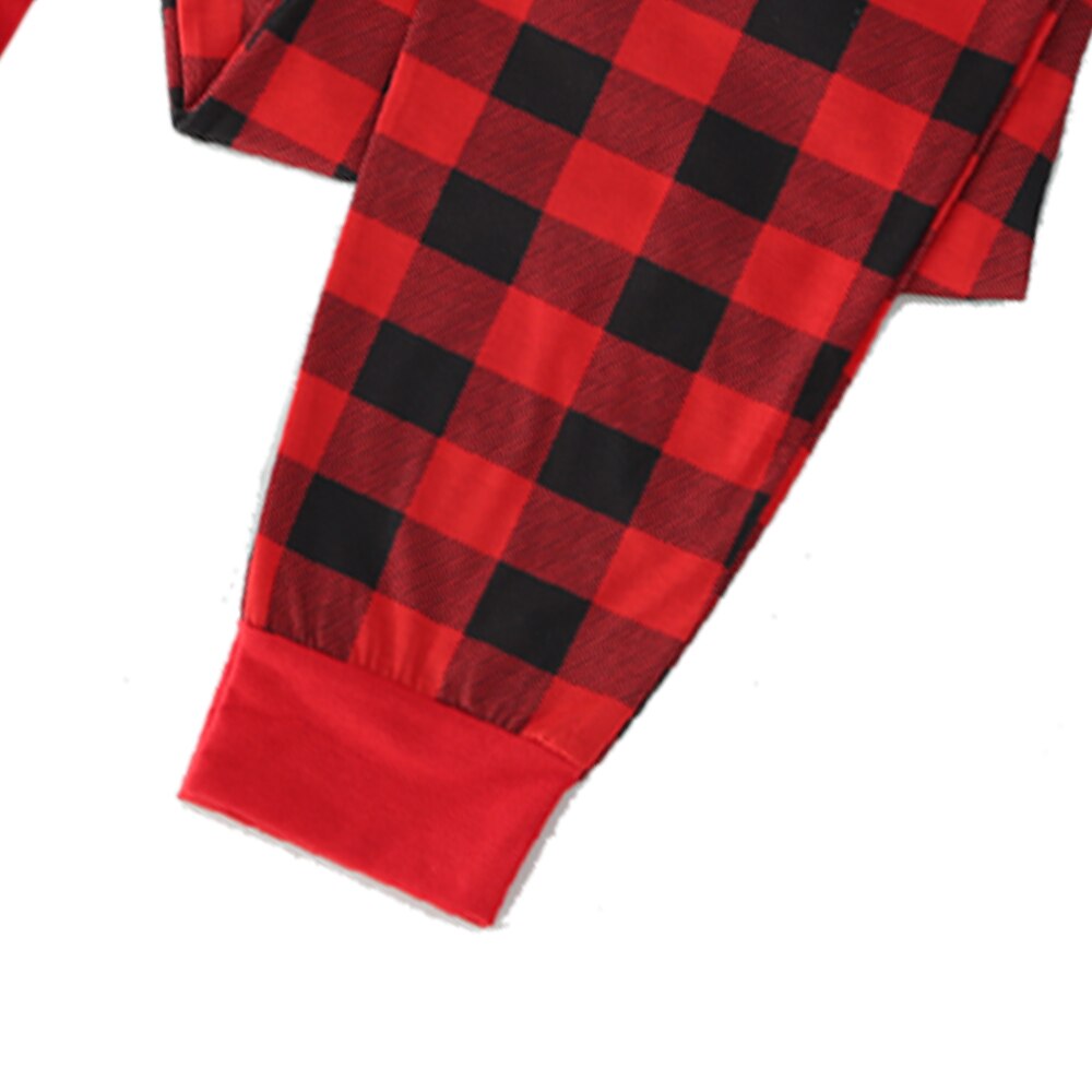 Detailed view of the festive print on family Christmas pajamas, ideal for holiday gifts