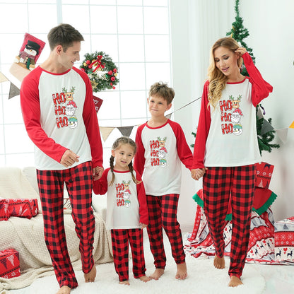 Matching Christmas outfits for the whole family, featuring a comical snowman print on soft polyester.