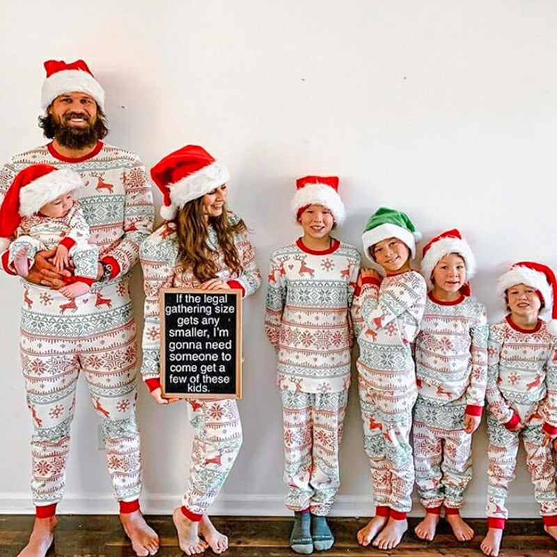 Cozy family matching Christmas pajamas with cute snowman print, ideal holiday loungewear and gift idea