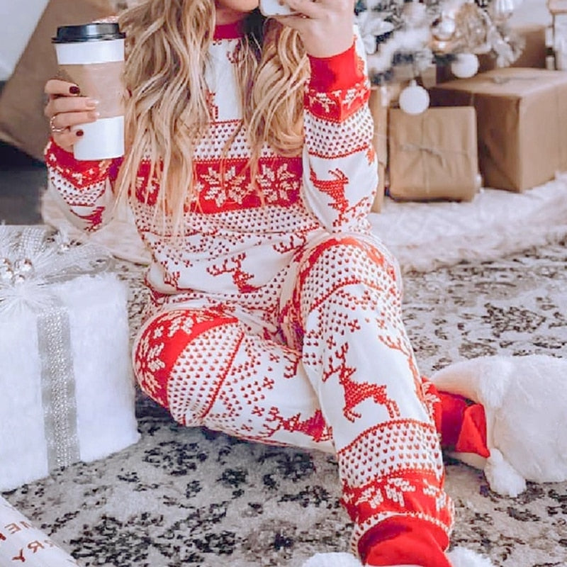 Family matching Christmas pajamas set with winter wonderland scene, festive and cozy cotton sleepwear for holiday fun