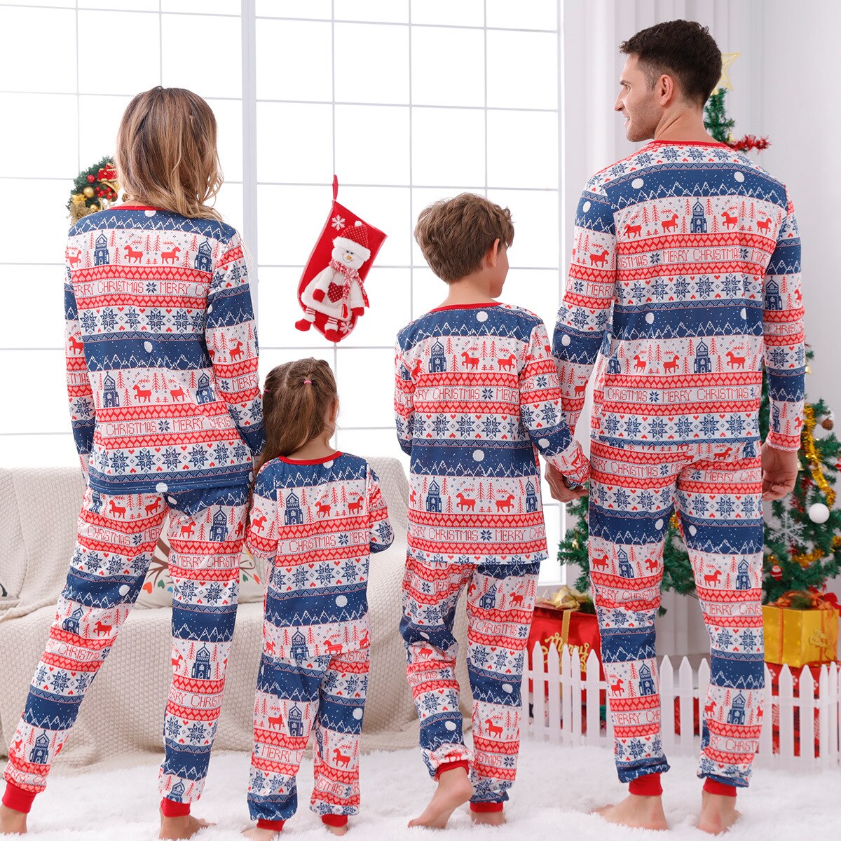 Detailed view of 'Peace' print on family matching Christmas pajamas, showcasing unique festive design