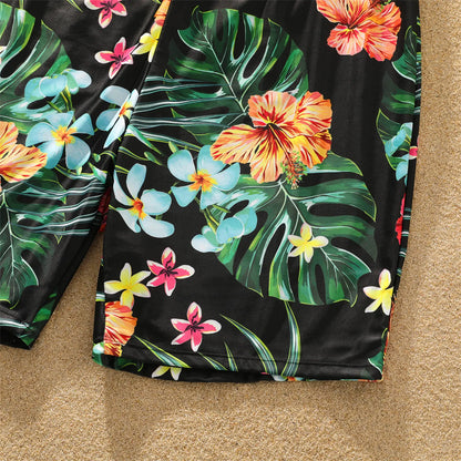 Group of family members wearing matching coconut print beachwear enjoying a sunny summer day.
