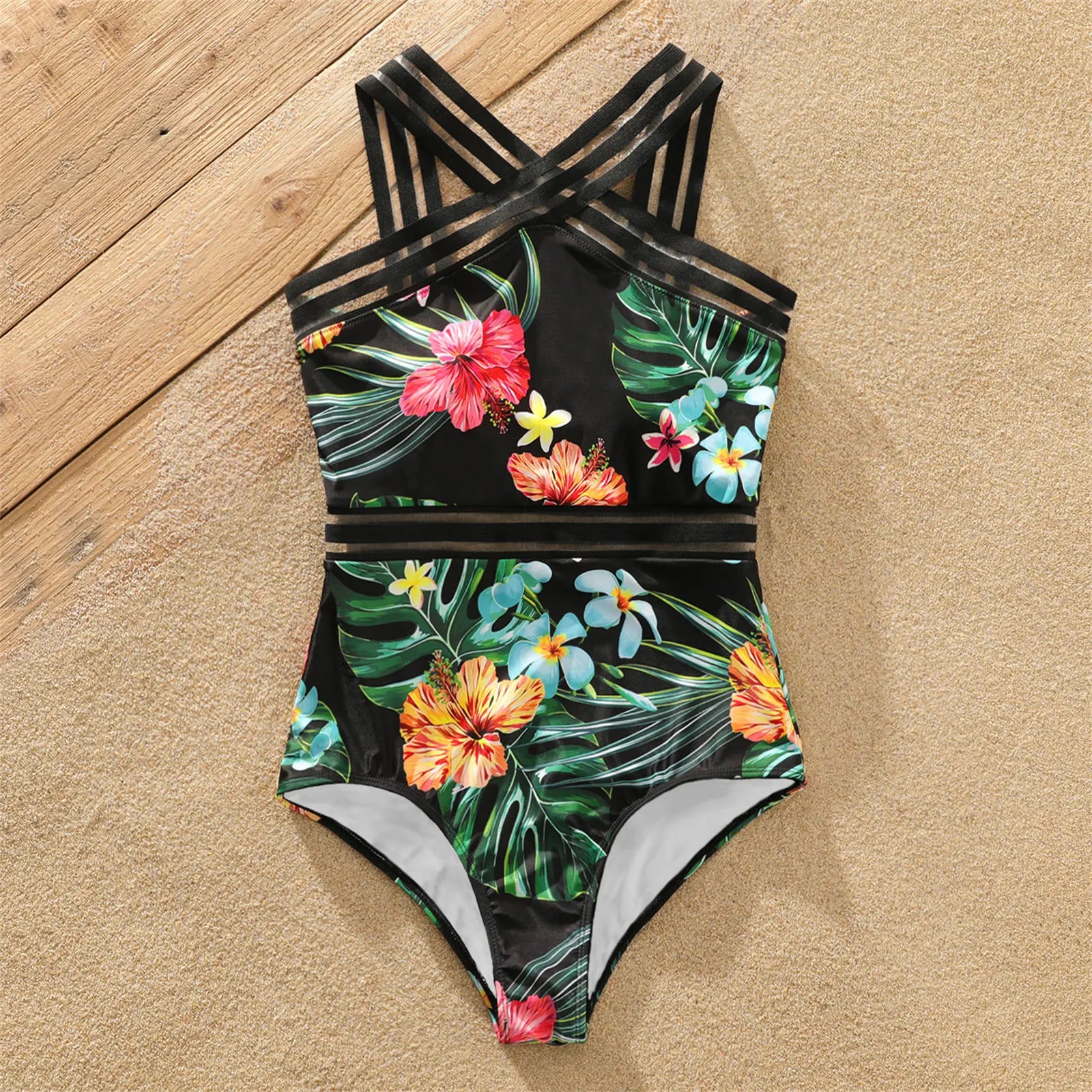 Father and son matching coconut print swimming trunks, ideal for family photos and poolside relaxation.