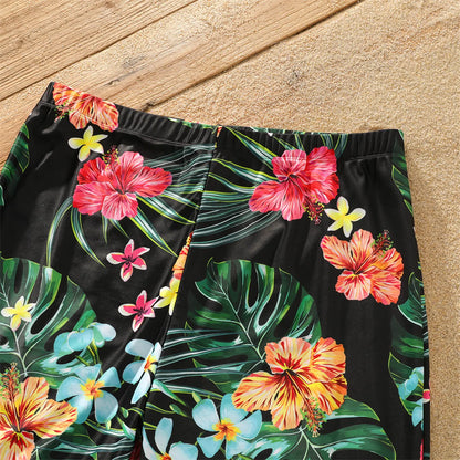 Full set of family matching coconut print swimwear and shorts laid out for summer vacation planning.