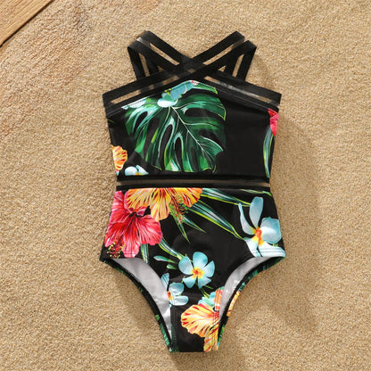 Matching men's swimming trunks with coconut tree print for dad, perfect for family beach adventures.
