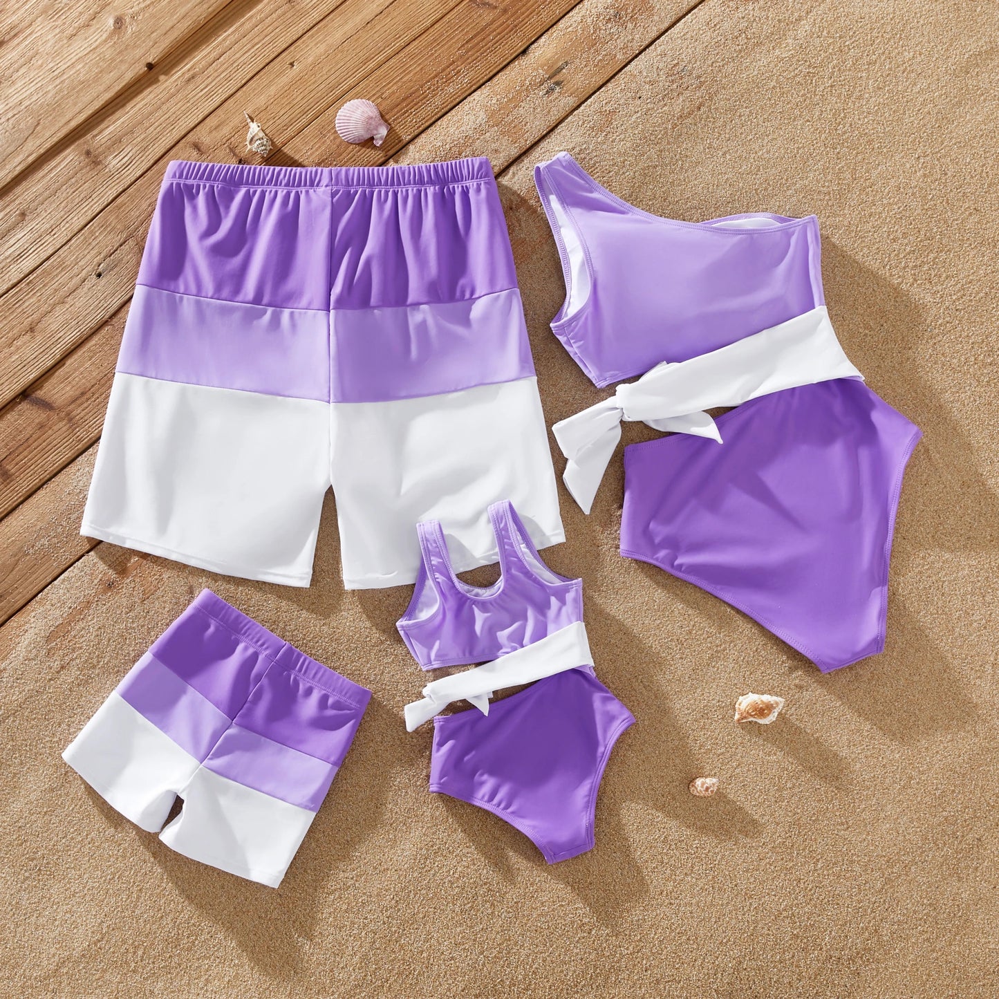 Mom and daughter in one-shoulder color-block swimsuits, quick-dry fabric