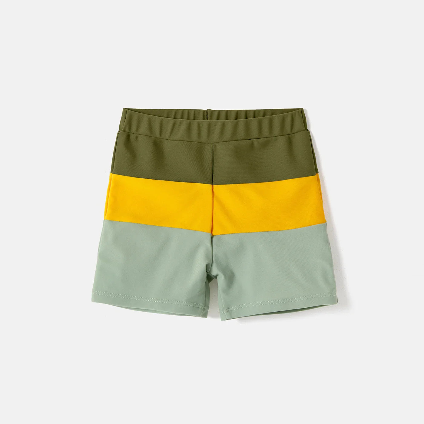 Parents and kids in matching colorblock one-shoulder swimsuits and coordinating swim trunks