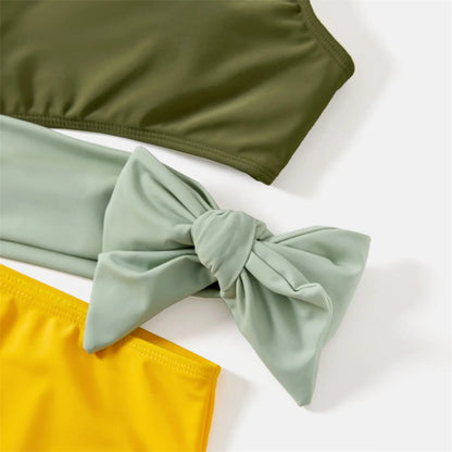 Stylish family matching colorblock swimwear set, perfect for beach or pool on vacation