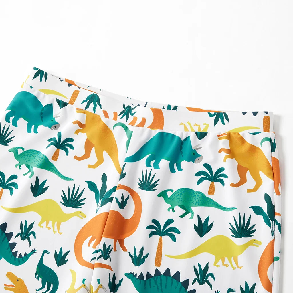 Men's blue dinosaur print swim trunks, quick-dry fabric, ideal for swimming and beach activities.