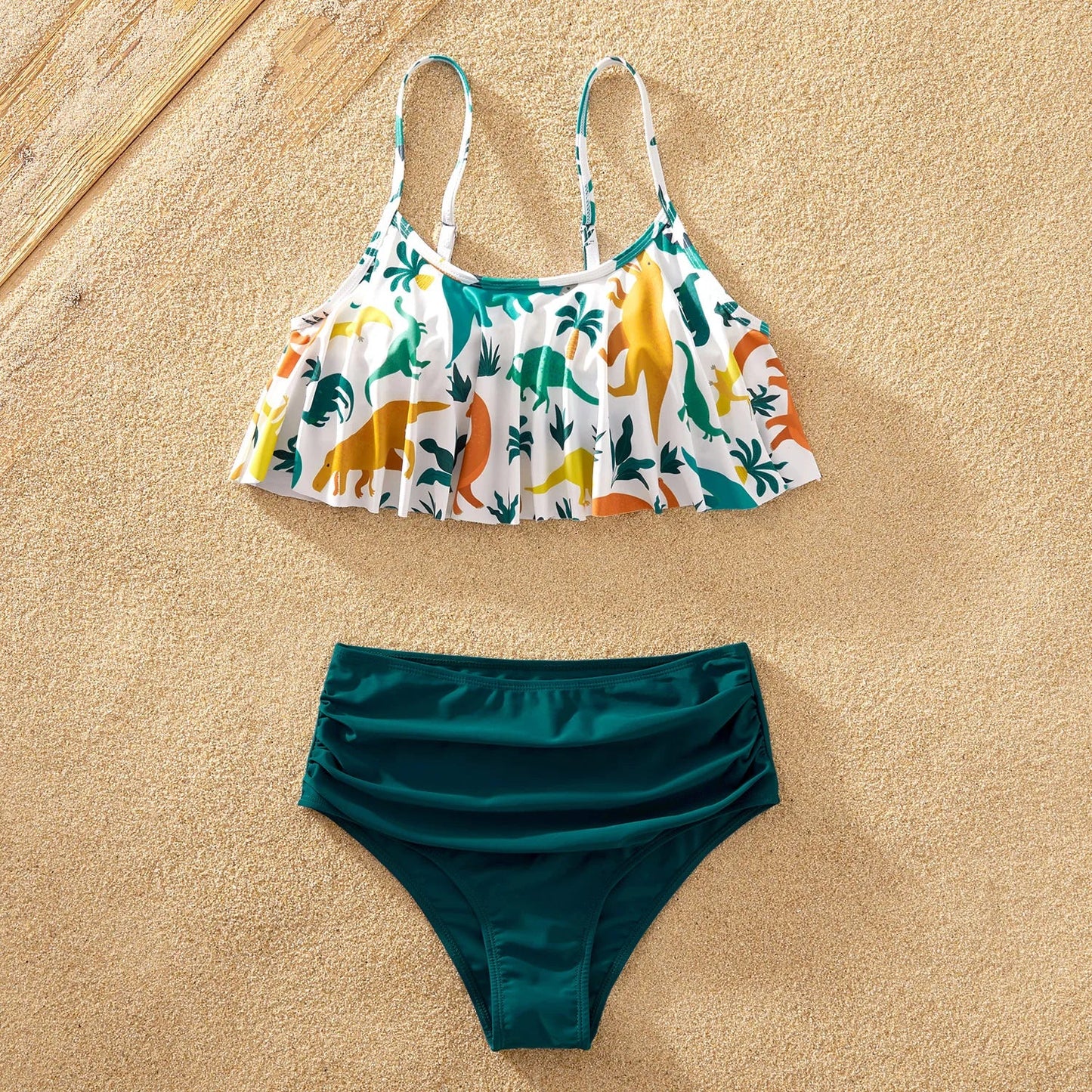 Women's blue dinosaur print one-piece swimsuit, comfortable and stylish for summer beachwear.