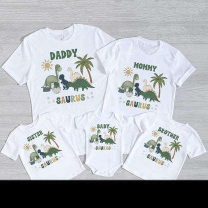 Parent and child wearing matching casual dinosaur print t-shirts, ideal for fun family summer wear