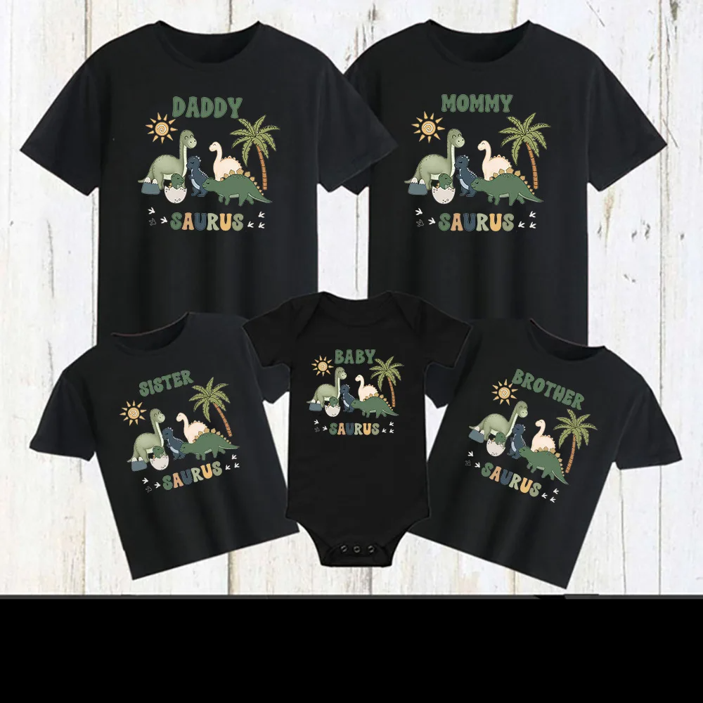 Adorable baby in a dinosaur print romper, part of a unisex family matching outfit collection