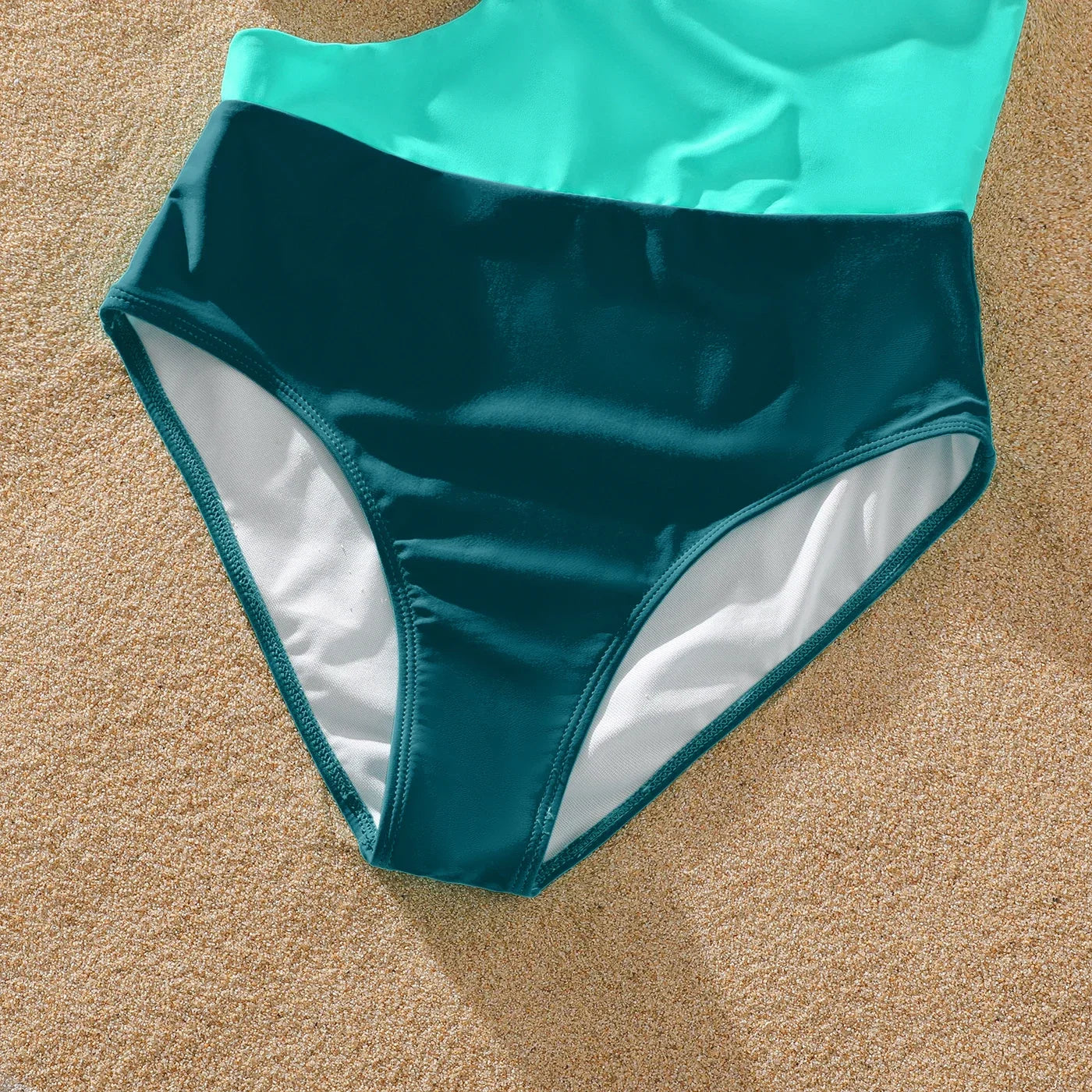 Green one-shoulder swimsuit with a sweet bow detail, family beach vacation wear