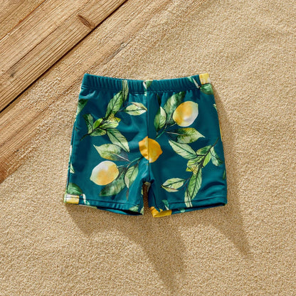 Girls' lemon print one-piece swimsuit, perfect for kids' pool fun.